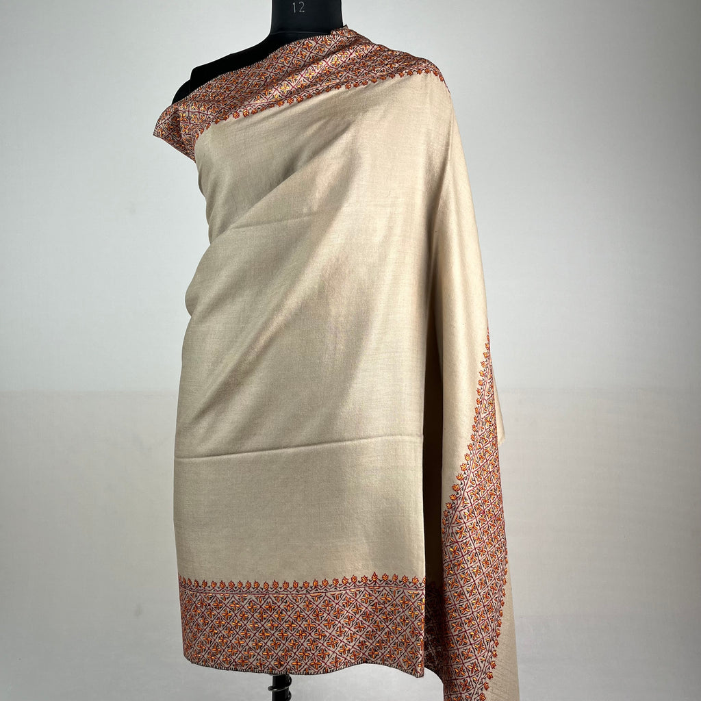 Close-up of Sozni needlework on light brown Pashmina shawl