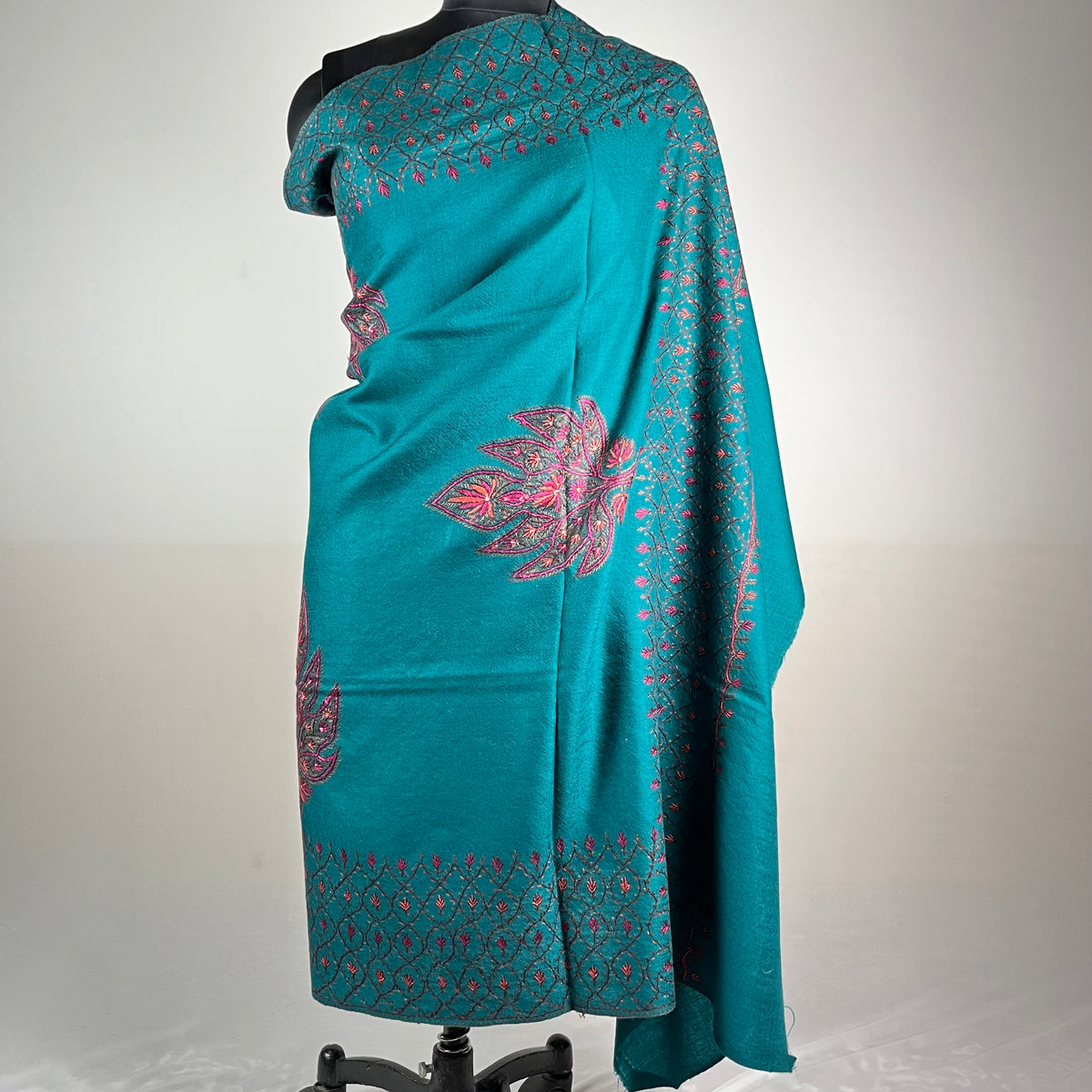 Close-up of Sozni needlework on blue Kashmiri Pashmina shawl